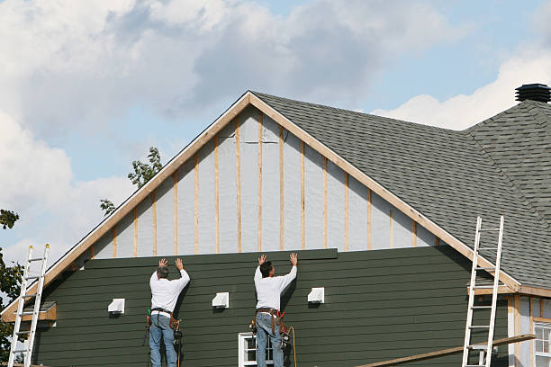 Professional Storm Damage Siding Repair technician working in Wickliffe, OH